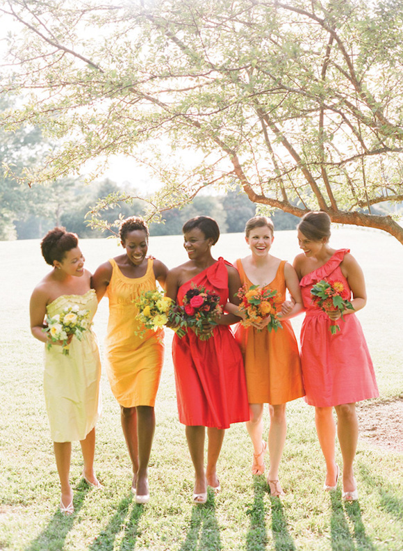 Bridesmaids wearing tonal colours